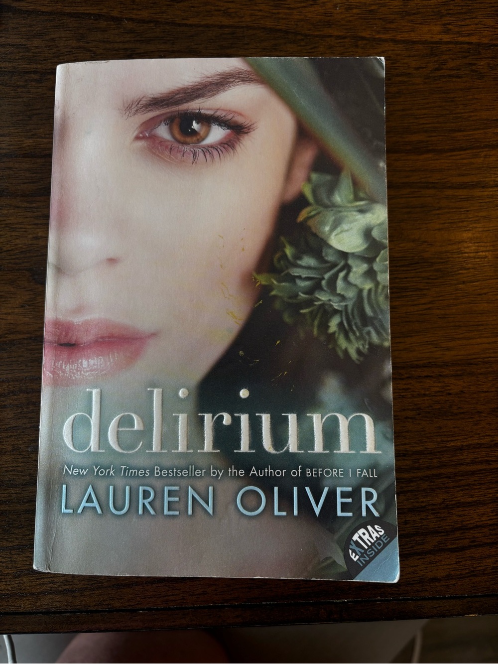 Delirium by - Paperback Book - Green/Beige Cover